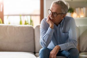 Man wondering, "Does addiction last a lifetime?"