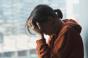 Woman experiencing the stigma of addiction