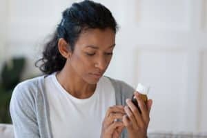 What are three warning signs of prescription drug abuse?