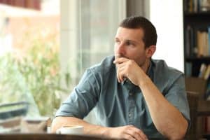 Man thinking about his polysubstance abuse