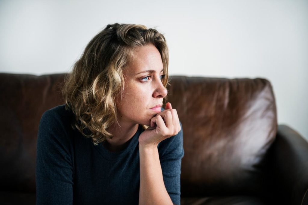 Woman thinking intently about fentanyl myths