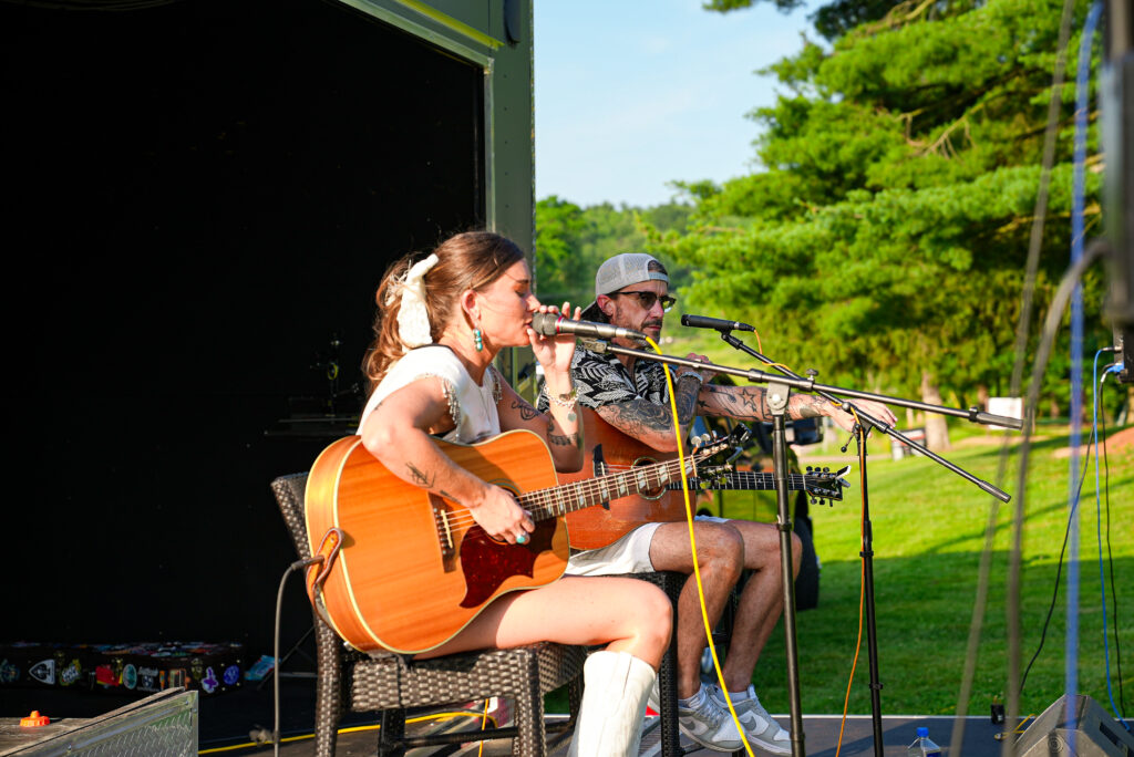 Kensie Coppin and Gary Nichols performing at The Bluffs Addiction Campuses