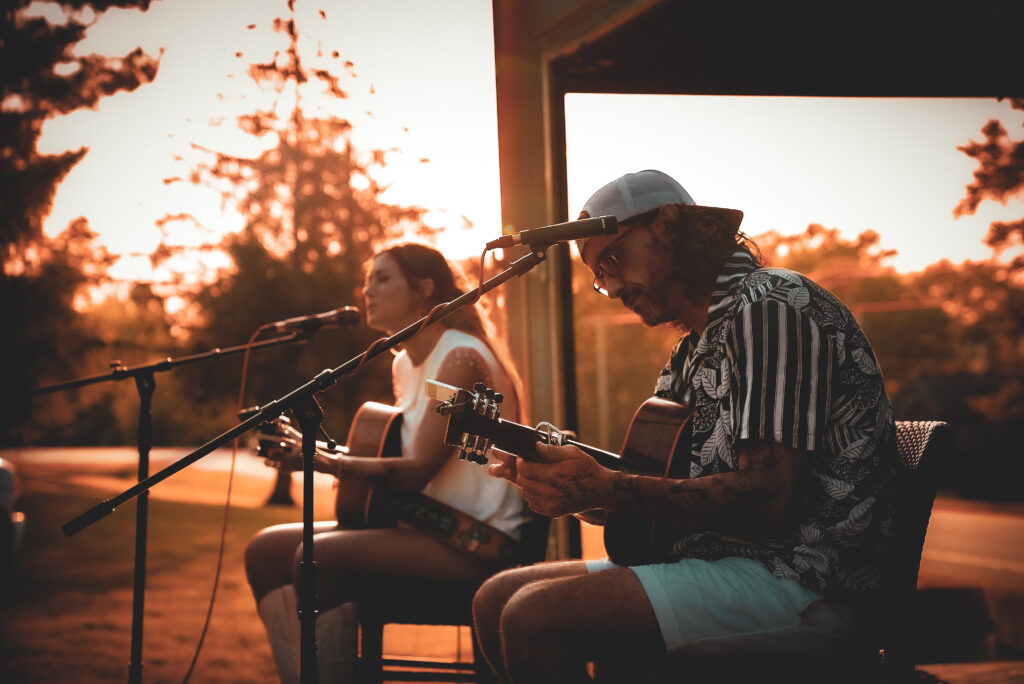 Gary Nichols and Kensie Coppin performing at The Bluffs in June 2025