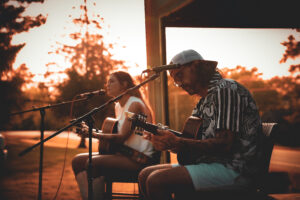 Gary Nichols and Kensie Coppin performing at The Bluffs in June 2025
