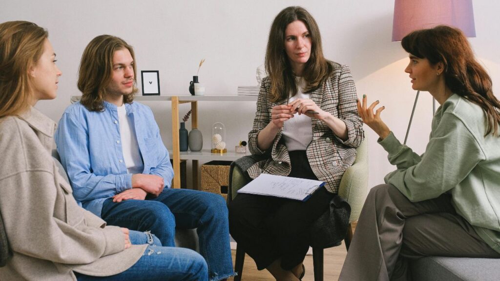 Shot of a group holding an intervention. The Bluffs in Ohio offers resources and guidelines for one of the biggest moments in someone's life.