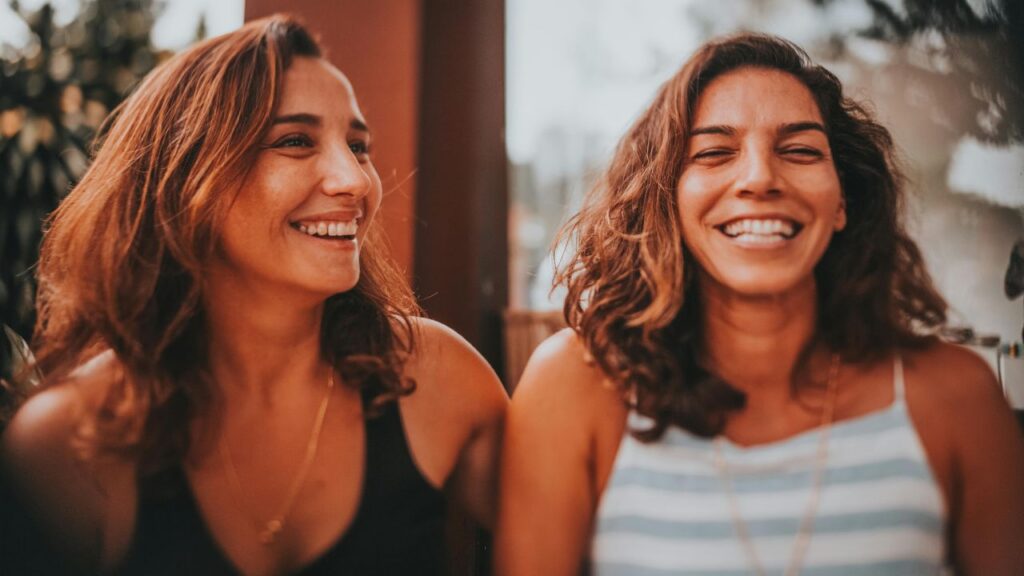 Two friends talking. Learn about what to say when someone goes to rehab.