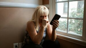 Photo of a woman calling a rehab